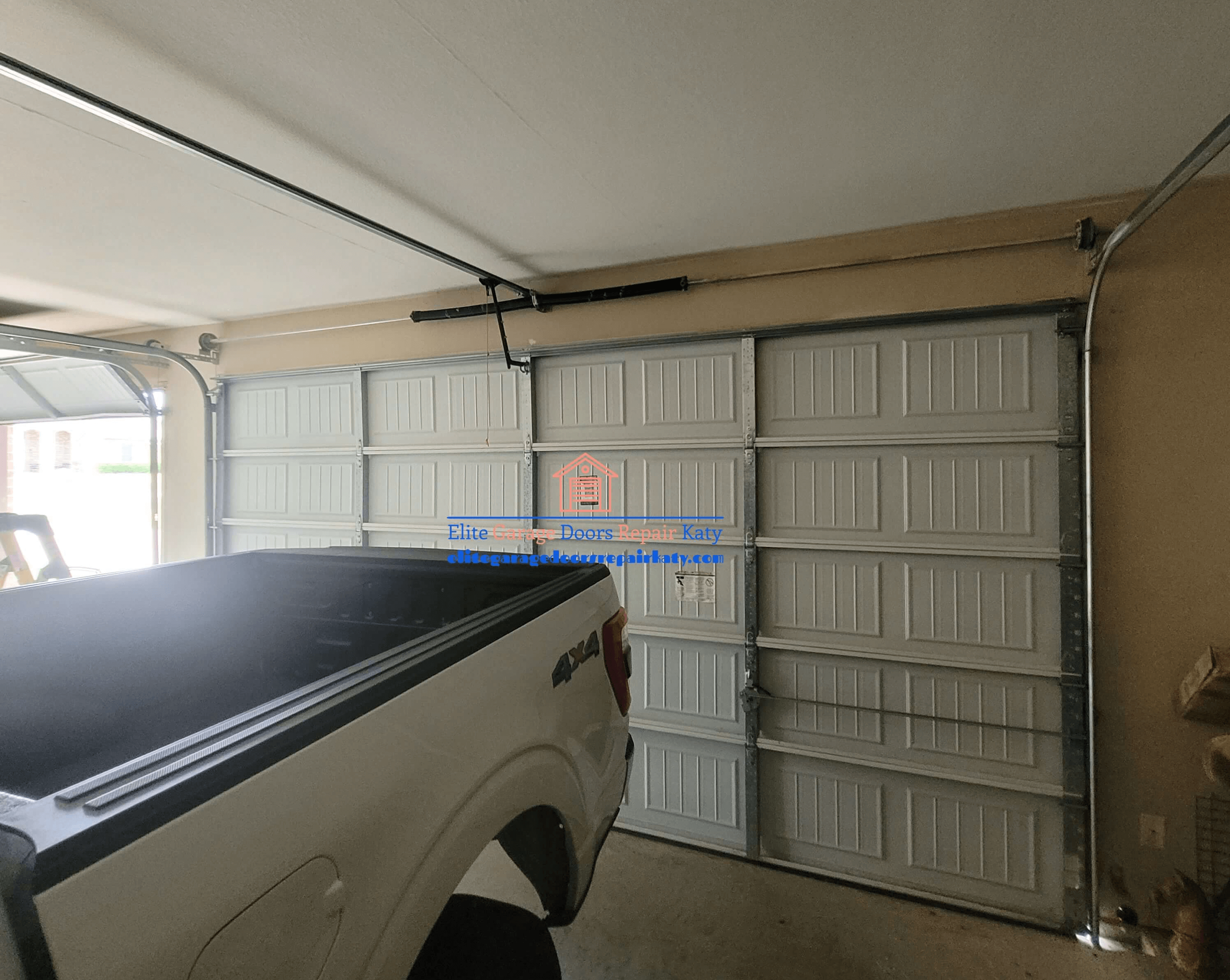 elitegaragedoorsrepairkaty.com_new_garage_door_opener_replacements