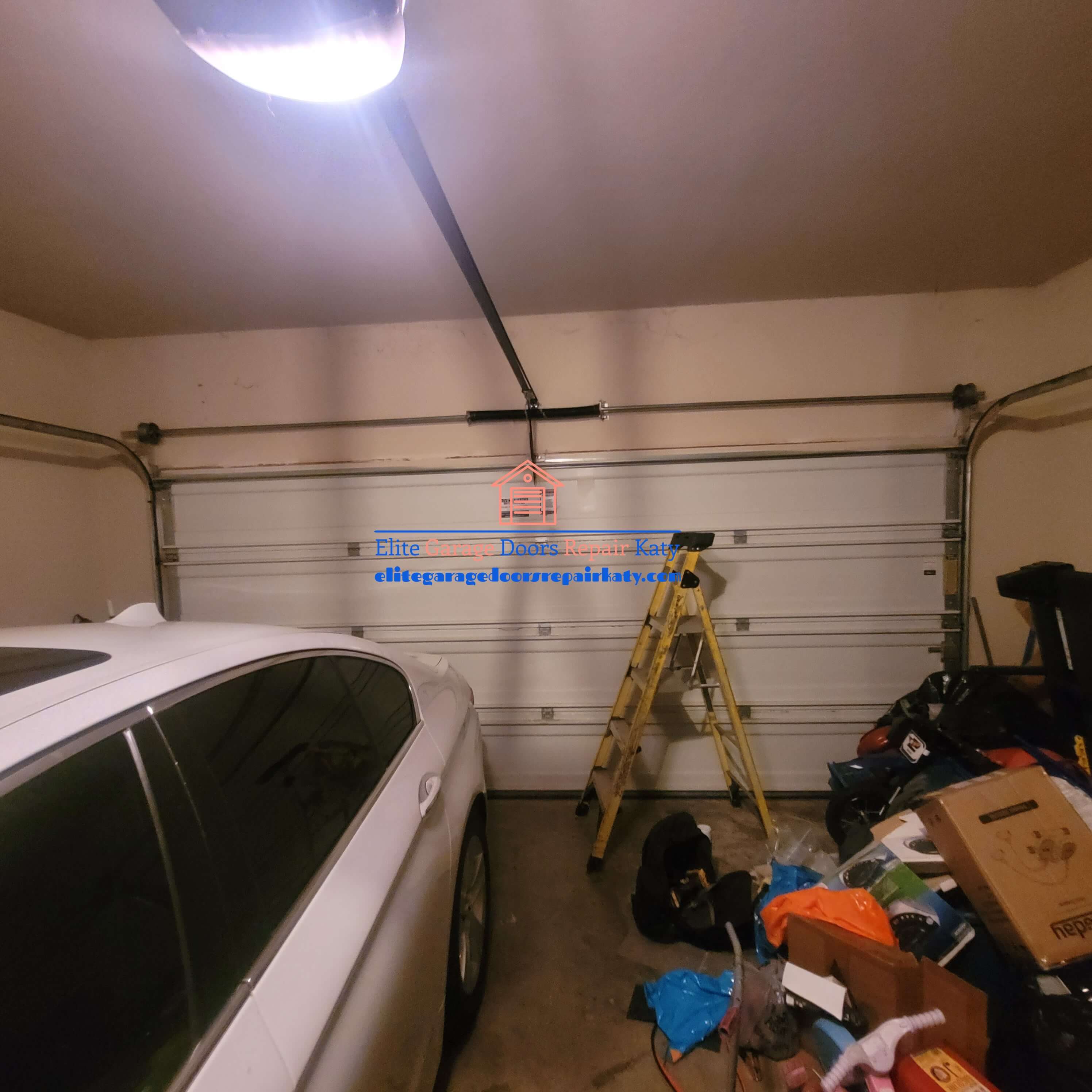 elitegaragedoorsrepairkaty.com_wayne_dalton_garage_door_spring_conversion